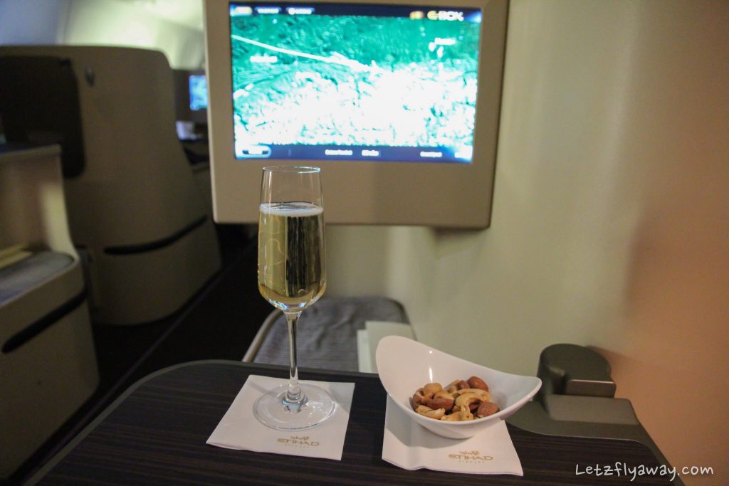 etihad business class boeing 777 champagne service