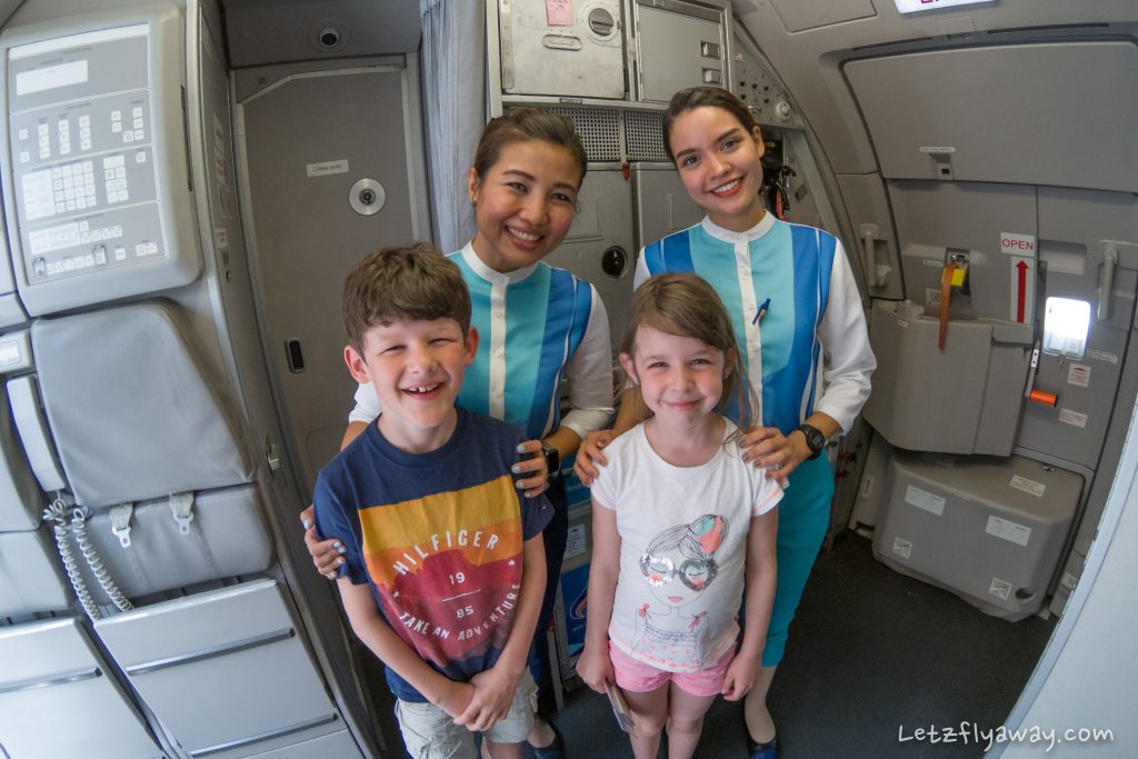 Bangkok Airways cabin crew with children
